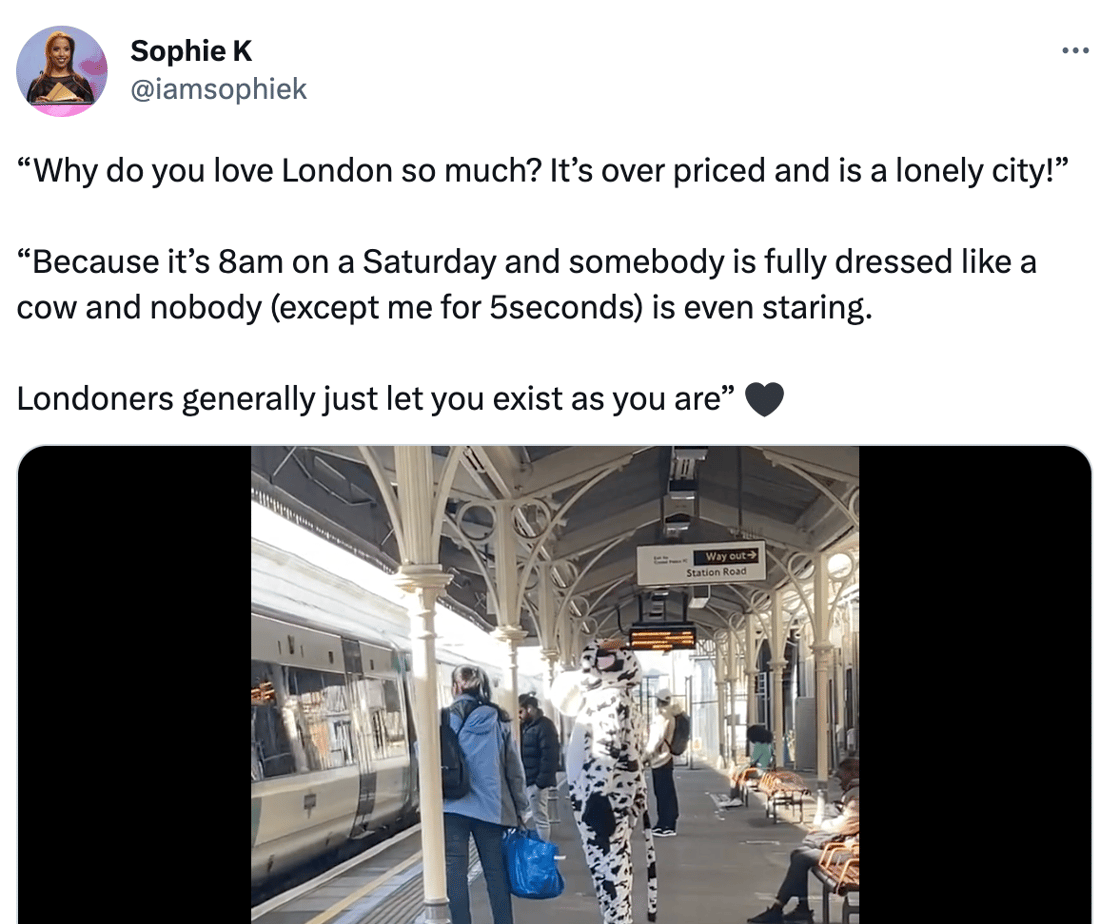 Sophie K tweet with video of person dressed as a cow at a train station platform in London
